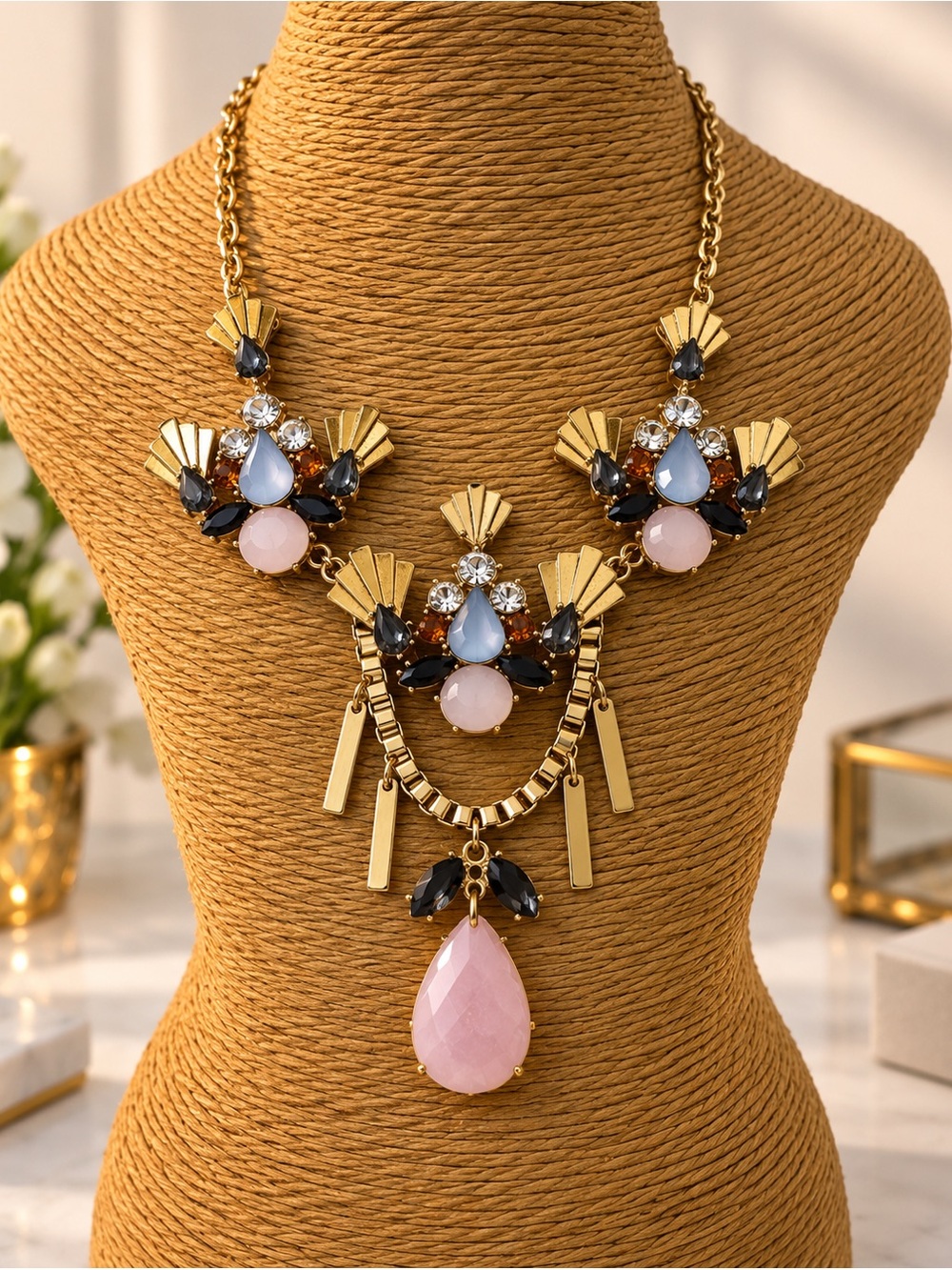 Elegant Gold Statement Necklace with Pink and Blue Stones